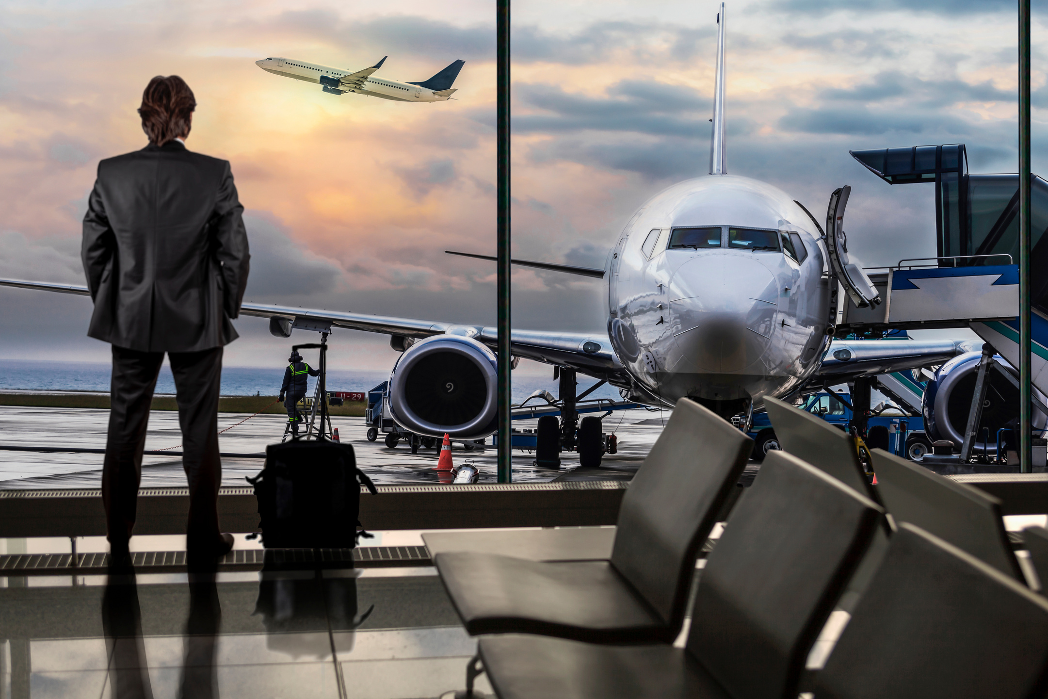 Man Waiting for Flight in Airport Lounge